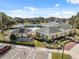 Image shows community center with pool, tennis courts, picnic area and parking lot at 5492 Legend Hills Ln, Spring Hill, FL 34609