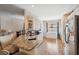 Bright kitchen with stainless steel appliances, granite countertops, and breakfast bar seating at 5492 Legend Hills Ln, Spring Hill, FL 34609
