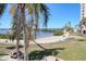 Gorgeous beach access with sand, picnic tables, chairs, and tropical foliage at this lovely condo complex at 5915 Sea Ranch Dr # 211, Hudson, FL 34667