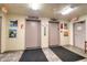Condominium elevators with adjacent artwork at 5915 Sea Ranch Dr # 211, Hudson, FL 34667