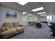 Spacious game room with a pool table, foosball, game table, and comfortable seating area, perfect for entertaining at 5915 Sea Ranch Dr # 211, Hudson, FL 34667