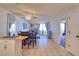 Bright living space with tile floors, ceiling fan and view from the kitchen at 5915 Sea Ranch Dr # 211, Hudson, FL 34667