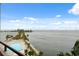 Aerial view of complex pool and waterfront at 6035 Sea Ranch Dr # 408, Hudson, FL 34667