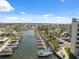 Scenic aerial view of the community docks and canal featuring boat slips and serene waterways at 6035 Sea Ranch Dr # 408, Hudson, FL 34667