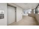 Interior view of the elevator lobby featuring modern elevator access to residential units and common areas at 6035 Sea Ranch Dr # 408, Hudson, FL 34667