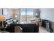 Comfortable living room with sliding glass doors that lead to a balcony and overlook the ocean at 6035 Sea Ranch Dr # 408, Hudson, FL 34667