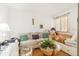Comfortable living space featuring a sofa, daybed, and a wicker accent table on hardwood floors at 6035 Sea Ranch Dr # 411, Hudson, FL 34667