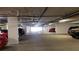 Secured covered parking garage with ample parking spaces for residents and guests at 6035 Sea Ranch Dr # 411, Hudson, FL 34667