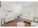 Bright Bedroom with changing table, crib, and neutral decor at 625 Lafayette Blvd, Oldsmar, FL 34677