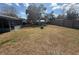Large backyard with a fire pit and plenty of room to entertain at 6361 Boxwood St, Brooksville, FL 34602