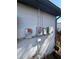 Close-up of the home's exterior electrical meter and boxes at 6361 Boxwood St, Brooksville, FL 34602