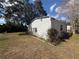 View of the exterior of home with bushes at 6361 Boxwood St, Brooksville, FL 34602
