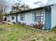 Quaint single-story home with heart-shaped shutters and front yard at 6361 Boxwood St, Brooksville, FL 34602