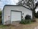 Detached metal garage with roll up door at 6361 Boxwood St, Brooksville, FL 34602