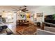 The inviting living room opens to the kitchen and offers a comfortable seating area at 6710 Devonshire Ln # 10A, New Port Richey, FL 34653