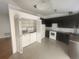 A kitchen featuring stainless steel appliances, white tile backsplash, and tile floors at 7125 Silverwood Dr, New Port Richey, FL 34654