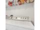 Convenient laundry room boasts a washer, dryer and plenty of shelving at 7205 Pinehurst Dr, Spring Hill, FL 34606