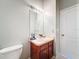 Bathroom vanity with mirror and vanity light at 7624 Red Mill Cir, New Port Richey, FL 34653