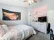 Bright bedroom with modern decorations, neutral walls, and carpeted floor at 7624 Red Mill Cir, New Port Richey, FL 34653