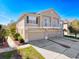 Beautiful multi-level home featuring an attached three car garage and second story balconies at 7624 Red Mill Cir, New Port Richey, FL 34653