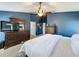 Serene bedroom featuring warm tones and comfortable furniture, designed for peaceful relaxation at 7624 Red Mill Cir, New Port Richey, FL 34653