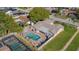 Aerial view of a home with a spacious backyard featuring a private pool and patio at 7901 Willow Brook Ct, Hudson, FL 34667