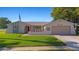 Charming single-story home featuring a well-manicured lawn and attached garage at 7901 Willow Brook Ct, Hudson, FL 34667
