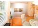 View of the dining area with view into kitchen at 8609 Regal Ln, Hudson, FL 34667