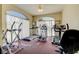 The fitness center features multiple cardio machines allowing residents to workout year round at 8609 Regal Ln, Hudson, FL 34667