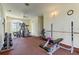 The fitness center features machines, weights and equipment for residents to achieve their fitness goals at 8609 Regal Ln, Hudson, FL 34667