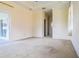 Spacious bedroom with sliding glass doors for backyard access and natural light at 10056 Lebanon Dr, Port Charlotte, FL 33981