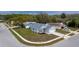 Corner lot home features a two-car garage and a well maintained yard at 10114 Briar Cir, Hudson, FL 34667