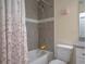 Bathroom featuring a bathtub with shower and neutral color palette at 10114 Briar Cir, Hudson, FL 34667