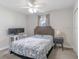 Bedroom with desk and chair, neutral color palette, and ample light at 10114 Briar Cir, Hudson, FL 34667