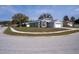 Inviting single-Gathering home on a corner lot features a well-maintained lawn and attached garage at 10114 Briar Cir, Hudson, FL 34667