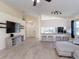 Open concept living room with a kitchen bar area at 10114 Briar Cir, Hudson, FL 34667
