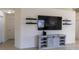 Entertainment center in open concept living area at 10114 Briar Cir, Hudson, FL 34667