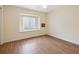 This bedroom boasts hardwood floors, bright natural light and a ceiling fan at 10285 Velvetseed Cir, Spring Hill, FL 34608