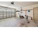 Spacious garage with ample room for storage and a vehicle at 10285 Velvetseed Cir, Spring Hill, FL 34608