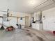 Spacious garage with ample room for storage and a vehicle at 10285 Velvetseed Cir, Spring Hill, FL 34608