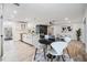 Open concept kitchen flows into the dining and living area, perfect for entertaining Gathering and friends at 12215 Snead Pl, Tampa, FL 33624