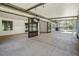 Spacious, covered outdoor patio with an outdoor ceiling fan and backyard access at 12215 Snead Pl, Tampa, FL 33624