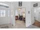 Inviting foyer with an open view to a sitting room, a chandelier, and tile flooring at 12446 Quail Ridge Dr, Spring Hill, FL 34610