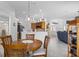 The breakfast nook is a versatile open-concept space with natural light and tile floors at 12446 Quail Ridge Dr, Spring Hill, FL 34610