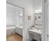 Bright main bathroom with double vanity, and large tub, perfect for relaxation at 12446 Quail Ridge Dr, Spring Hill, FL 34610