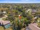Overhead shot of the home, showcasing its location in a verdant neighborhood with mature trees at 1267 Meredith Dr, Spring Hill, FL 34608