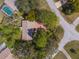 Bird's-eye view of home displaying the location of pool, yard, and other nearby properties at 1267 Meredith Dr, Spring Hill, FL 34608