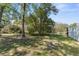 A wide open, grassy backyard with some tree cover at 1267 Meredith Dr, Spring Hill, FL 34608