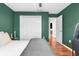 The bedroom boasts a large closet and entry to another room at 1267 Meredith Dr, Spring Hill, FL 34608