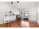 Inviting entry showcasing wood floors, abundant natural light, and traditional decor at 1267 Meredith Dr, Spring Hill, FL 34608